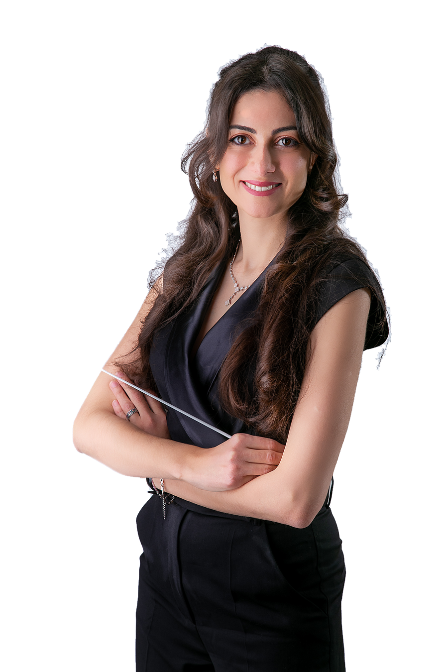Portrait of Amal Guermazi holding a conductor's baton